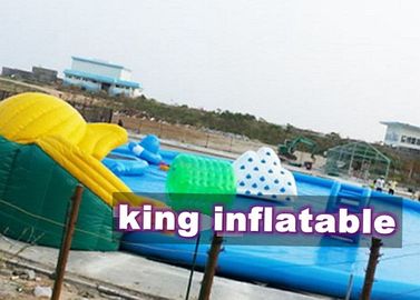 Custom 0.9mm PVC Inflatable Water Parks Pool With Slide And Toys On Land