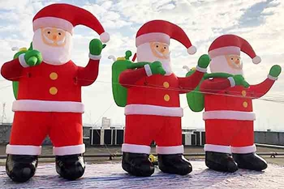 Ông già Noel bơm hơi khổng lồ Sân trang trí Giáng sinh Thổi phồng ông già Noel thổi phồng